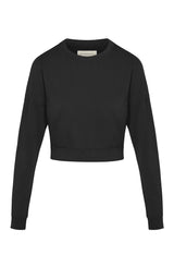 Woman’s crewneck cropped sweatshirt with drop shoulders and length to midriff made of organic and recycled cotton French Terry in color Onyx Black on mannequin 