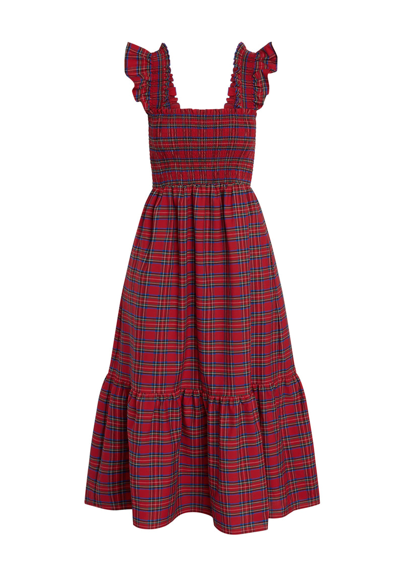 Red plaid dress with ruffled straps on a white background on Mannequin. 