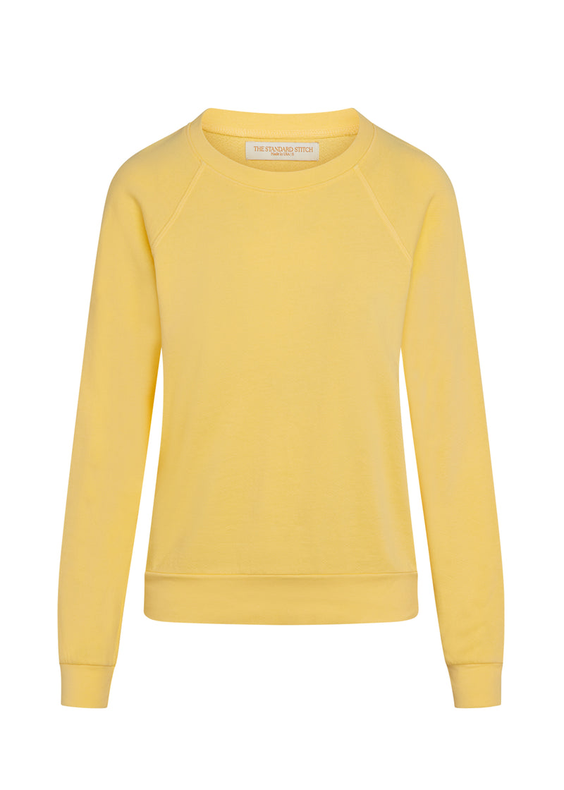 Women's yellow sweatshirt on mannequin. 